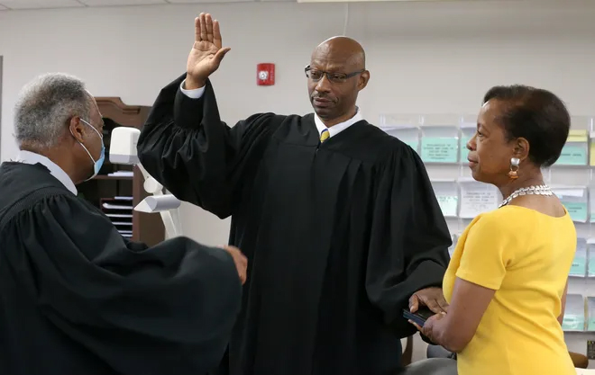 Judge Steverson taking oath during swearing-in ceremony